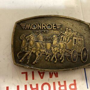 Monroe Shocks buckle
